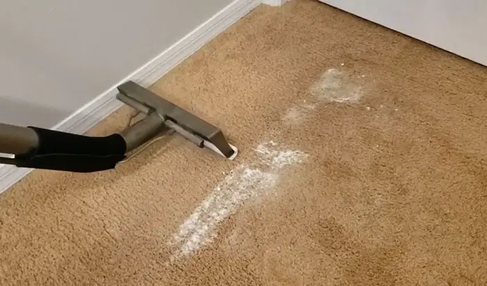 Wet vacuuming carpet after laundry detergent spill