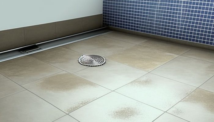 Cleaning drain grout