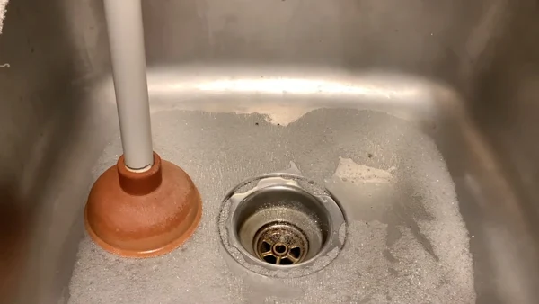 What Chemicals Do Plumbers Use to Unclog a Drain