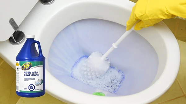 Why is an Acidic Cleaner Used to Clean a Toilet Bowl