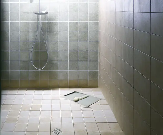 Comparing effects of different cleaners on shower surface