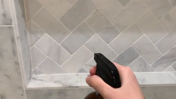 Clean marble shower grout