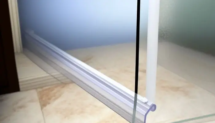 Using vinegar to clean discoloured shower door seals
