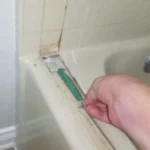 How to Remove Adhesive From Fiberglass Tub