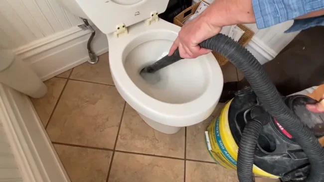 Drain Water from Toilet Bowl for Cleaning