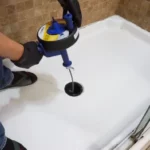 how to clean drain snake