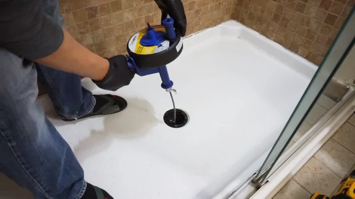 how to clean drain snake