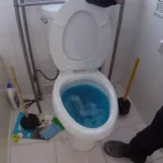how to clean floor after toilet overflows