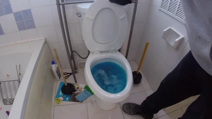 how to clean floor after toilet overflows