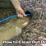 how to clean out drain tile