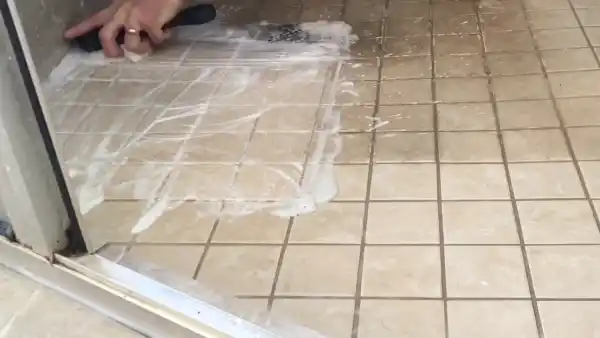 How do you clean a large walk in a tile shower