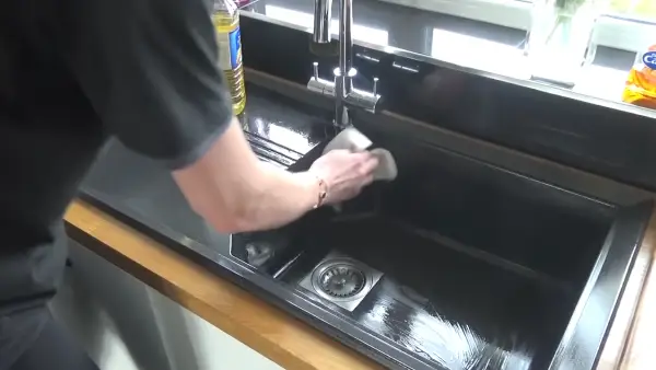 Do you require polishing a brass kitchen sink after completing the cleaning process